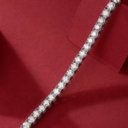 Moissanite tennis bracelet on a red background